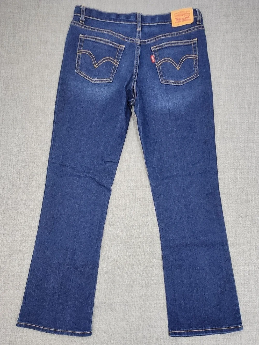 Levis Medium Wash Stretch Boot Cut Denim Jeans. 16.